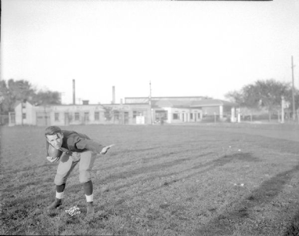 Central High School football player outdoors on a field.