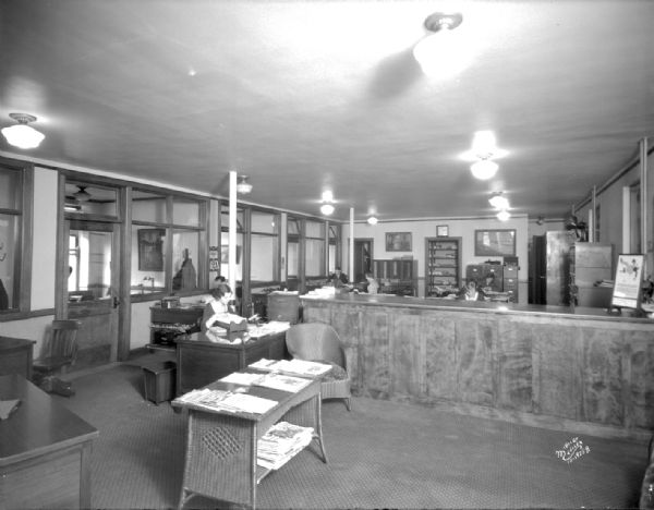 Reitan Lerdahl Co. office interior, showing six workers.