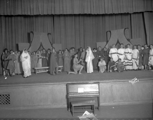 East High School Latin Department, with the large play cast on stage, for the bimillenium celebration of Vergil's birth. They were staging a play adapted from "Pax Romana" written by Lydia Dame.