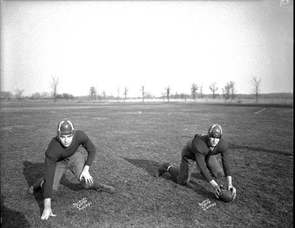Outdoor portrait of two Middleton High School football players, G. O'Brien and R. Keumer.