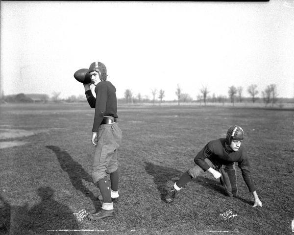 Outdoor portrait of two Middleton High School football players, D. Stricker and A. Baer.