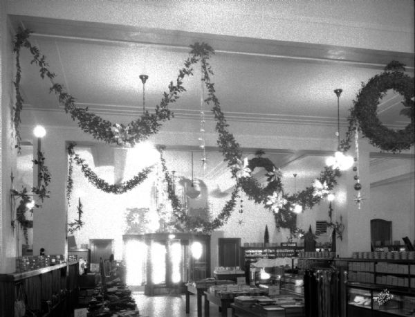 First floor of Manchester's Department Store showing Christmas decorations. Alternate view.