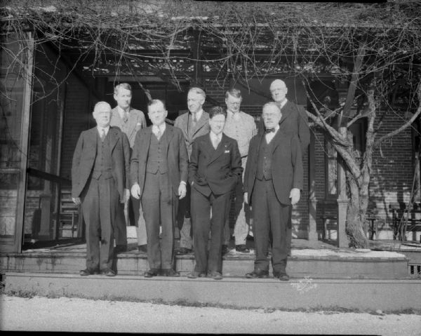 Phil La Follette confers with rail chiefs. Front row (left-right): F.B. Seymour, Green Bay and Western, Philip F. La Follette, Governor-elect, Fred W. Sargent, North Western Railroad, S.B. Way, TMER & L Milwaukee Railroad. Back row (left-right): F.E. Williamson, Chicago, Burlington and Quincy, C.T. Jaffrey, Minneapolis, St. Paul, and Sault St. Marie, H.A. Scandrett, Milwaukee Railroad, L.J. Falon, Chicago, North Shore, Milwaukee Railroad.
