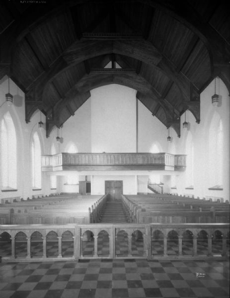 Interior view from the altar at St. Barnabas Catholic Church. Remodeled after a fire in 1929 with massive hammerbeam ceiling.