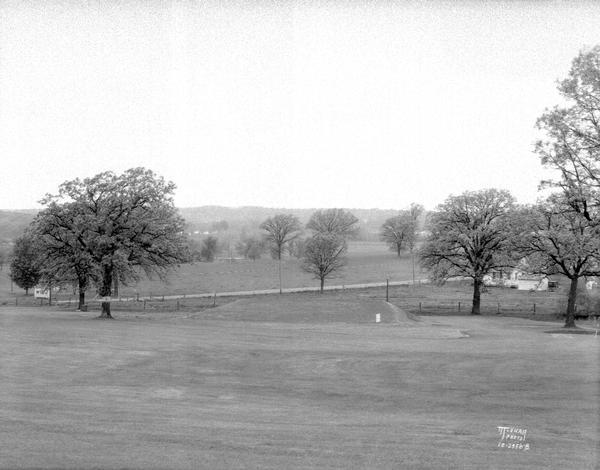New 5th green at Burr Oaks Golf Course, 2100 block South Park Street. Taken with 21 inch lens from hilltop.