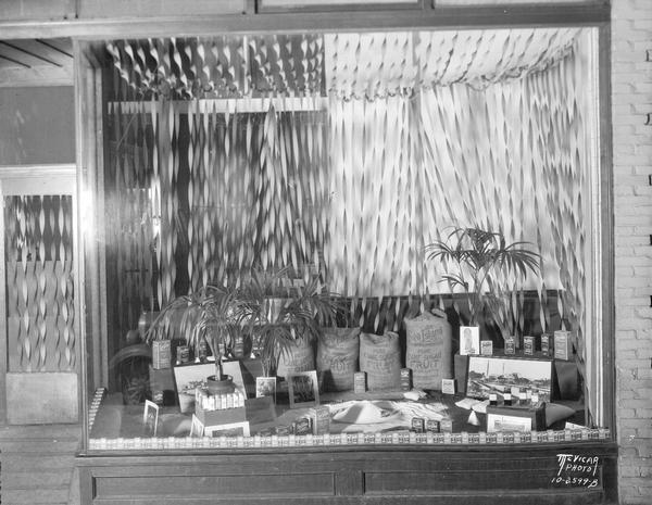Park Hotel, 22 S. Carroll Street, "Sea Island Sugar Co." display window showing various sizes of sugar packages and products.