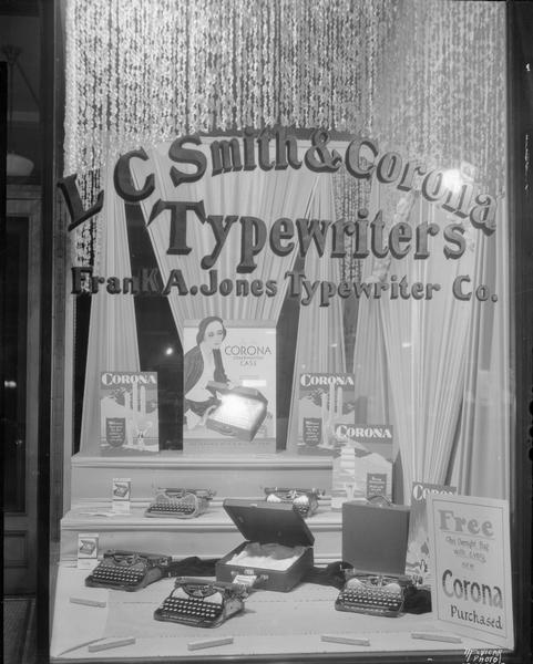 Frank A. Jones typewriter company display. Showing L C Smith & Corona typewriters. 514 State Street.