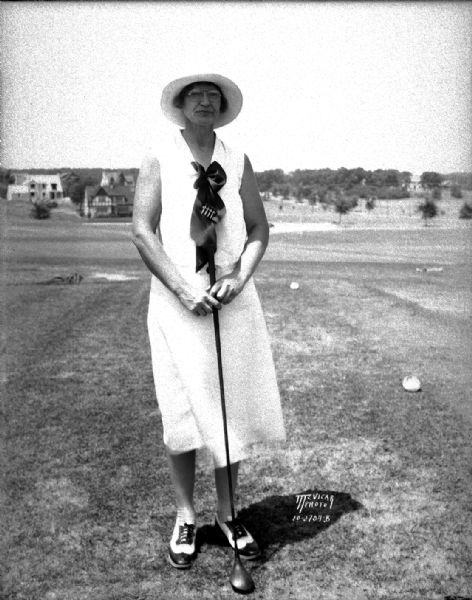 Mrs. Lee Statz, golfer, at Nakoma golf course.