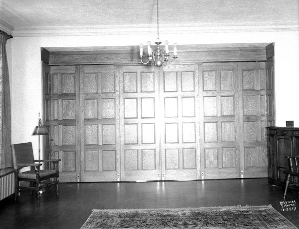 St. Francis House interior, showing folding wood partition, closed.