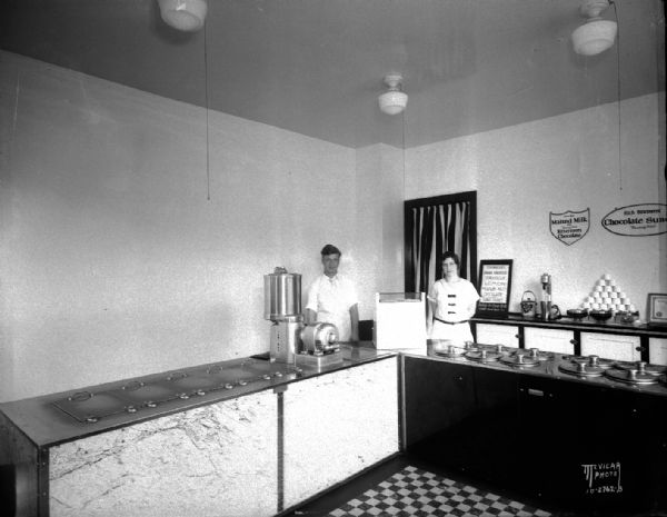 Interior of Eat More Ice Cream Shop, opened by  Hans P. Schleicher, under the direction of Eleanor Owens, at 1301 Williamson Street.