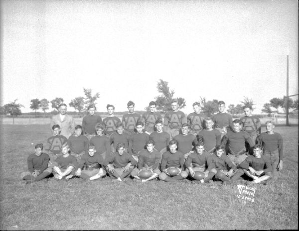 Outdoor group portrait of the Middleton football team.