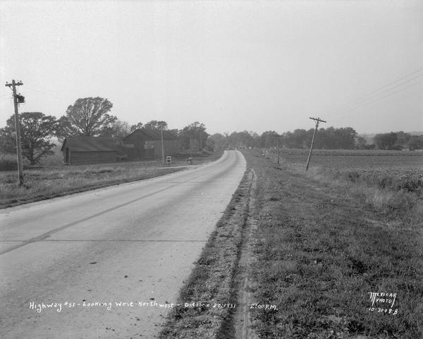 Accident scene on Highway 51, rural area. Caption at bottom reads: "High #51 — Looking West — Northwest — October 20, 1931 2:00 P.M."