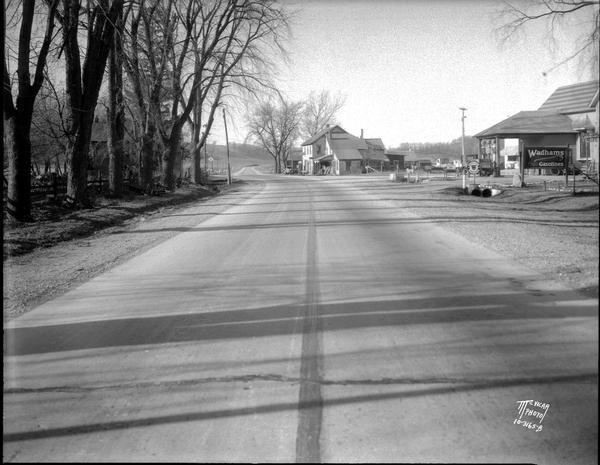 Springfield Corners view, with a Wadhams filling station at the crossroads, and houses and a garage.