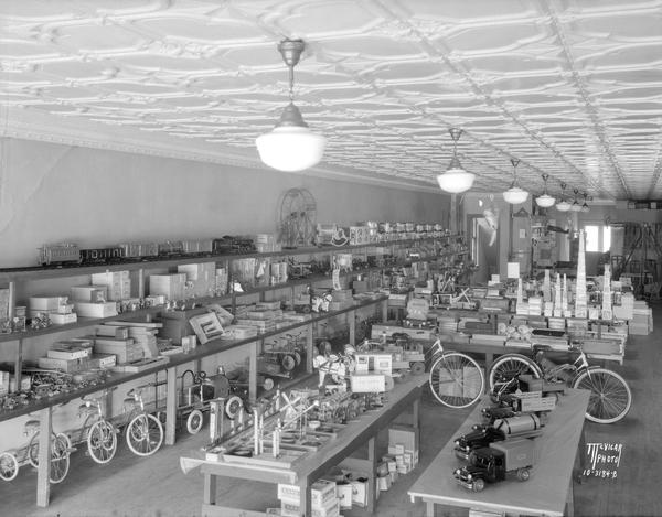 Slightly elevated view of the Wolff-Kubly & Hirsig Co. interior, featuring the toy department. 17 S. Pinckney Street.