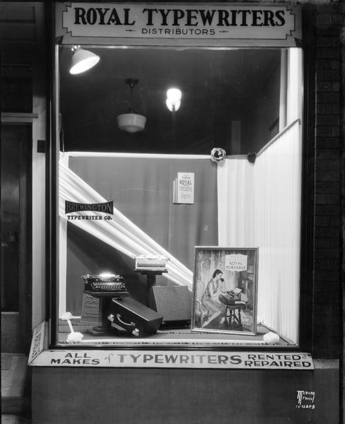 Royal typewriter window display at Brewington Typewriter Company, 533 State Street. The name was later changed to the Stemp Typewriter Company.