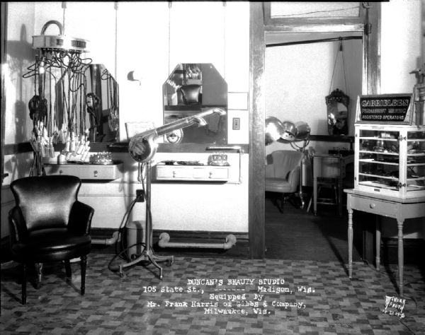 Interior of Duncan's Beauty Studio, 105 State Street, featuring dryer and waver.