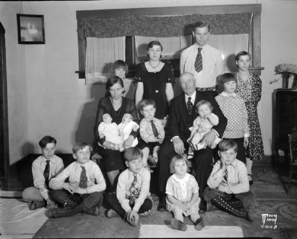 Group portrait of Mr. and Mrs. Hans Anderson, Morningside Heights, and their 14 children.