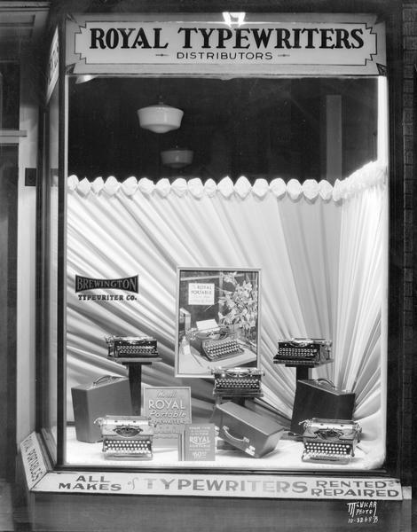 Window display of Royal typewriters at the Brewington Typewriter Company, 533 State Street. The name was later changed to the Stemp Typewriter Company.
