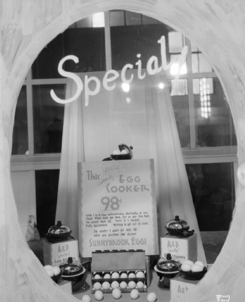 Display window for A & P Special Automatic Egg Cooker (Hankscraft) "available for 98 cents with purchase of 1 dozen Sunnybrook eggs."