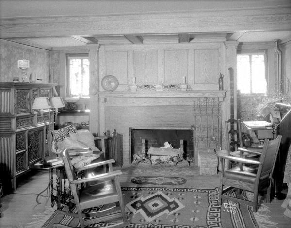 Living room and fireplace in the Chester and Caroline Lloyd Jones house, 1902 Arlington Place, University Heights.