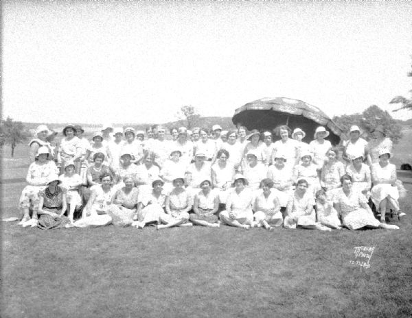 Outdoor group portrait of women at Nakoma Golf Course on Guest Day.
