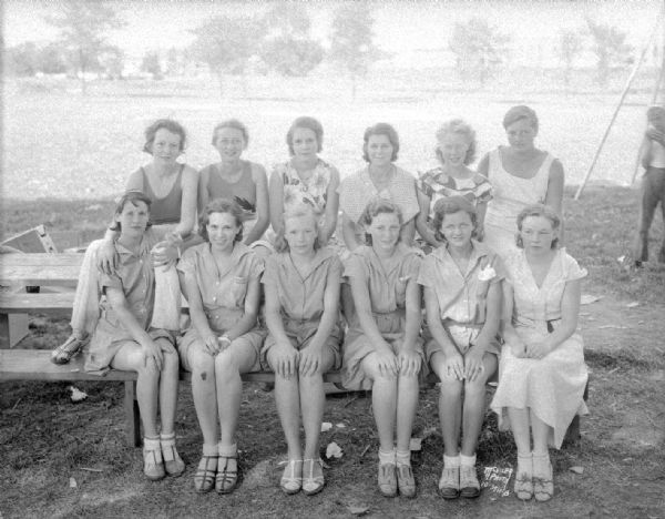 Group portrait of Lowell School playground girls' baseball team.