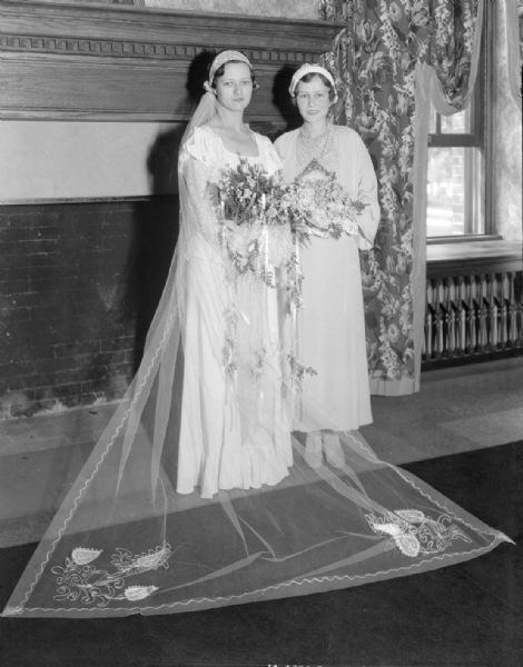 Portrait of bride, Louise Harrison (Mrs. Truman) Bloss, and her bridesmaid, Mary Thompson.