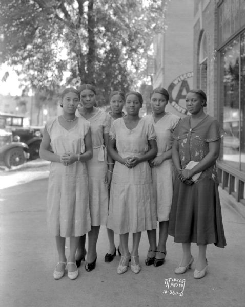 Six female Jubilee Singers from Prentiss Normal and Industrial Institute, Prentiss, Mississippi, with their director E.M. Hall.