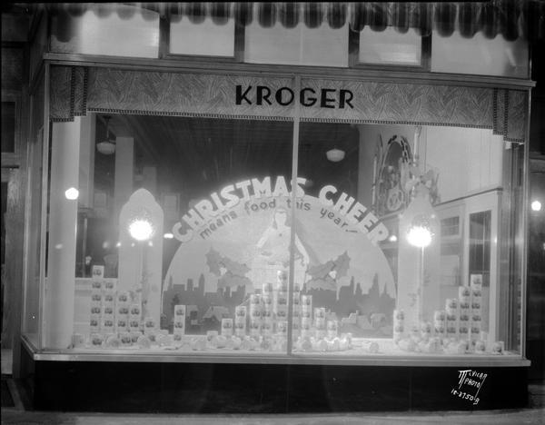 Kroger Grocery & Bakery, 3 N. Pinckney Street, Christmas window display, featuring a sign that reads: "Christmas Cheer means food this year."