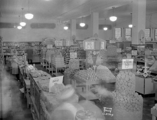 Kroger Grocery & Bakery, 3 N. Pinckney Street, showing fruit, vegetable, and bakery displays with a clerk behind the counter.