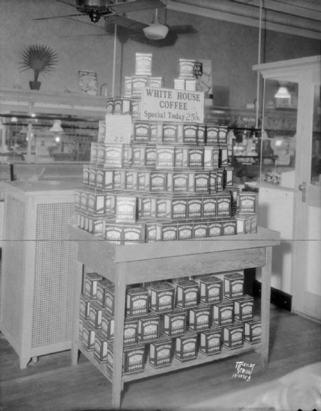 Display of White House coffee tins, Hommel Store, 11 N. Pinckney Street.