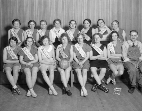 Group portrait of West High School women's soccer baseball championship team in uniform.