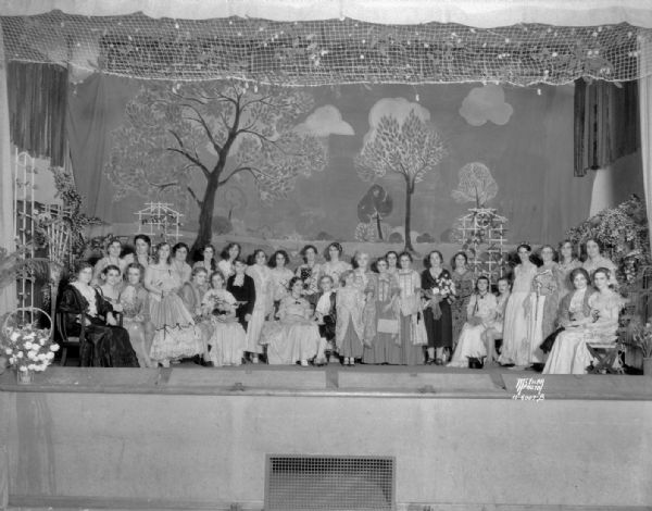 Franklin School P.T.A. theatrical group in costume on stage.