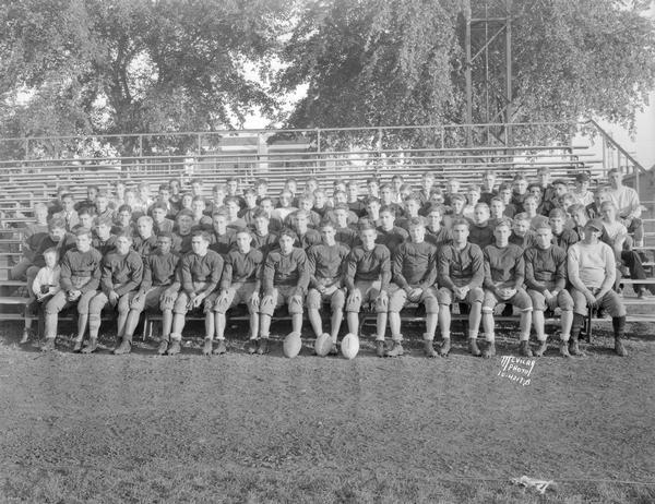 Group portrait of Central High school football squad.