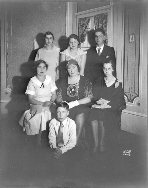 Portrait of five women, one man and a boy who are in a theater group in Mt. Horeb, participating in the Dane County rural drama tournament.