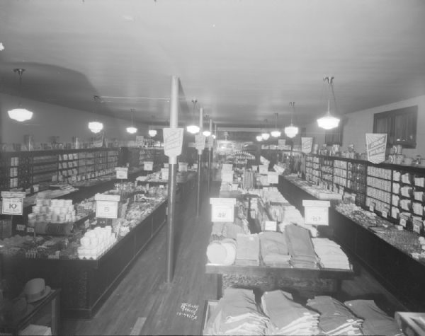 Grand opening of The Fair Store, 1202-1204 Williamson Street. Interior view from the rear.