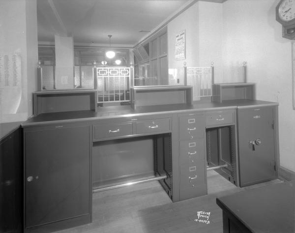Wisconsin Assessor of Incomes office, showing the back side of a Shaw Walker Counter which includes a safe.