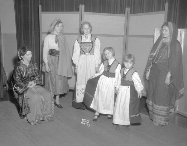 Woman's Club Shawl pageant, Chinese: Mrs. Harry Fease; Irish: Mrs. Thomas Hippaka; Norwegian: Mrs. George Mueller, Carol and Thea Kittleson; East Indian: Mrs. D. Mitchell.