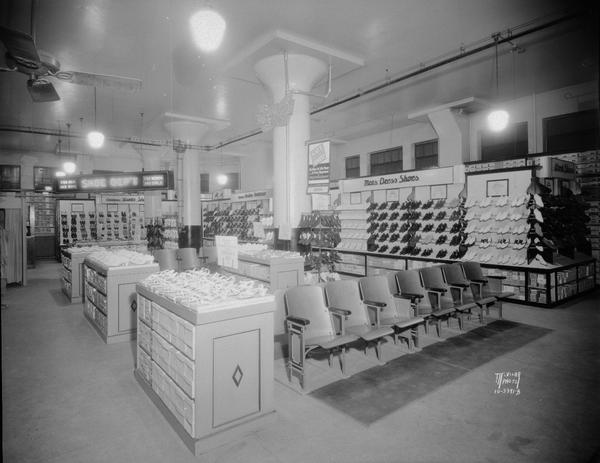 Hill's Department Store, 202 State Street, shoe department, showing pneumatic tube paying system.