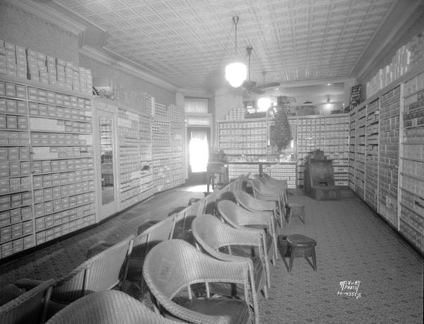 Huegel and Hyland Shoe Store, interior view, showing the x-ray machine in the background, 112 King Street.