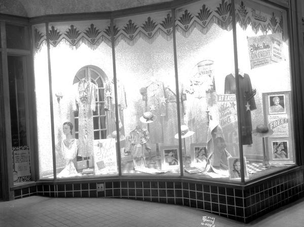 Moskin's Credit Clothing Co., 229 State Street, right display window of women's clothing.
