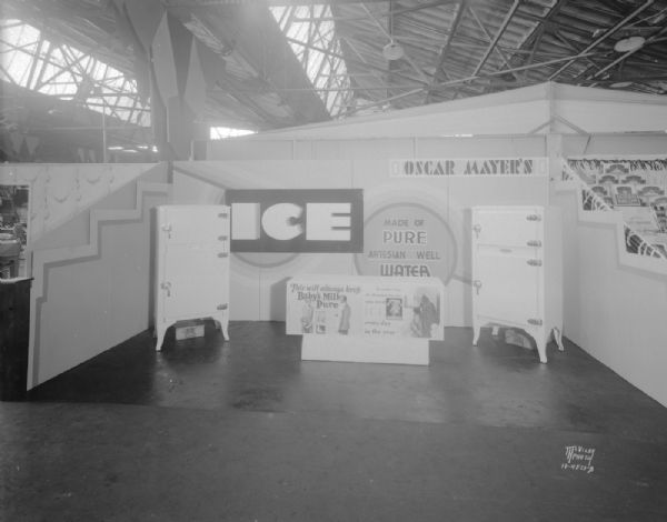 Oscar Mayer ice exhibit at Madison Home Show featuring iceboxes, signs: "Ice Made of pure artesian well water," "This will always keep baby's milk pure no matter what the temperature says, you need ice everyday in the year."