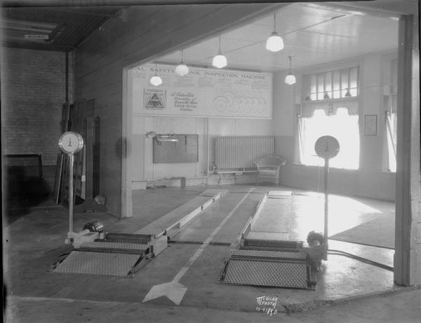 J.A. Brady Garage interior showing National Safety Clinic inspection machines. Joseph A. "Doc" Brady died in 1931. John Eichman became manager.