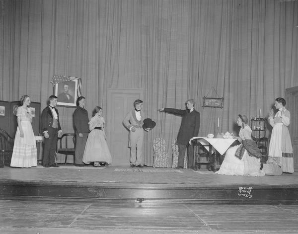 Central High School play scene from "Half Way Prairie." Shown in Civil War costumes, l to r: Violet Bagley, Jay Ashbrook, Stanley Custer, Aleen Anderson, Robert Genske, Aleen Saunders, Harriette Wright, and Ruth Klug.
