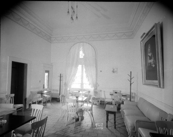 Victorian cocktail room, Park Hotel, featuring a portrait of Queen Victoria.