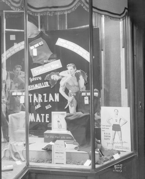 Window display at The Hub, 22 W. Mifflin Street, for the movie "Tarzan and His Mate." Window also shows Johnny Weissmuller in BVD Swimsuit.