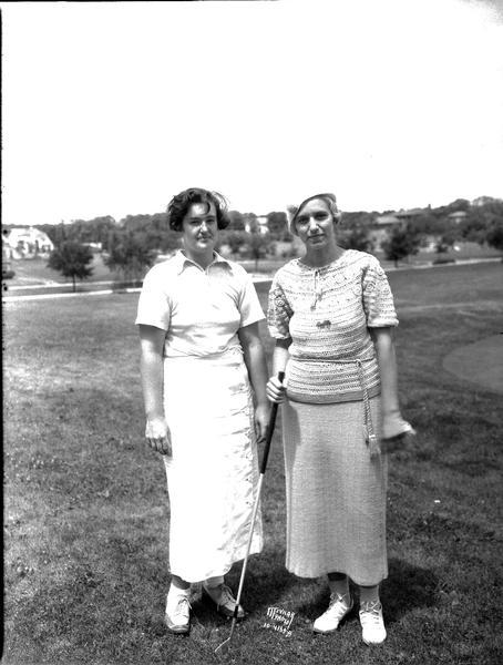 Marian Callahan, new women's state champion golfer and Mrs. Karl Luetke, former champion at Nakoma Country Club. It became Nakoma Golf Club in 1944.