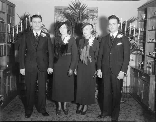 Valeria M. Keppel and Roland Fritz on their wedding day, with Virgina Keppel and Ernest Kloetzli, at the home of bride's parents, 825 South Shore Drive.