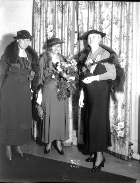 Portrait of three women's club presidents. Mrs. Hazel Jenks, 2015 Jefferson Street, President of the Madison Woman's club; Mrs. Grace Morrison Poole, General Federation President; and Mrs. F.H. Clausen, Horicon, State President.