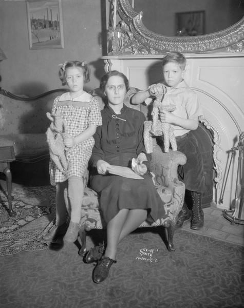 Portrait of Mrs. Phillip (Isabel) La Follette with Bob and Judy, her children, at the Governor's Residence, 130 East Gilman Street.